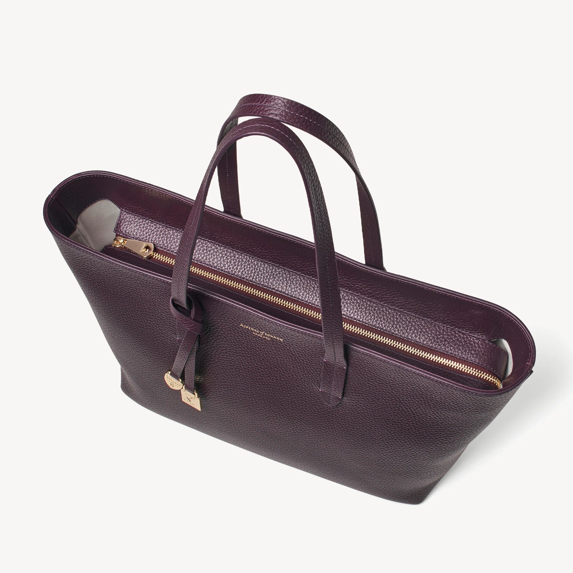Zipped East West Tote with Shield Charm