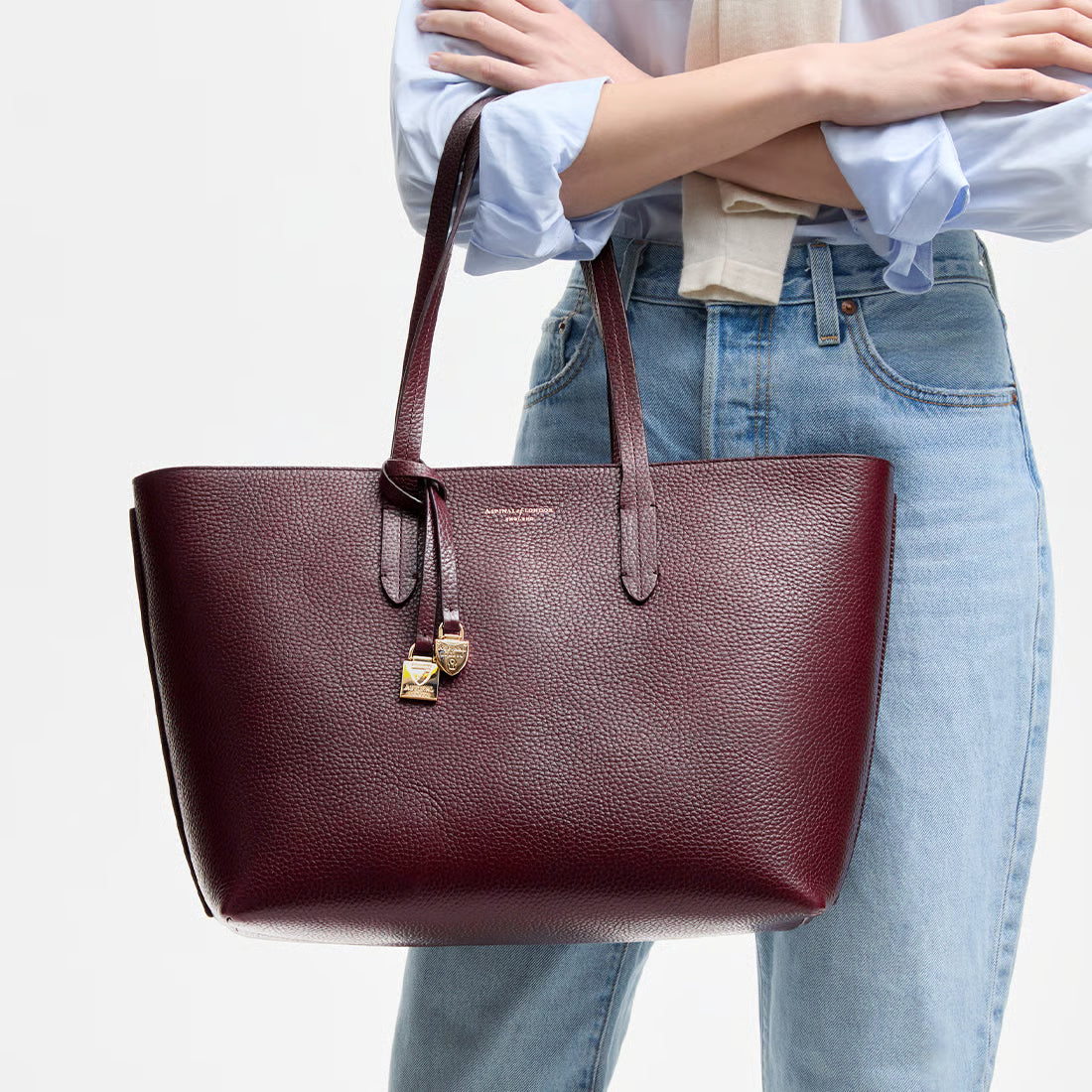 Zipped East West Tote with Shield Charm